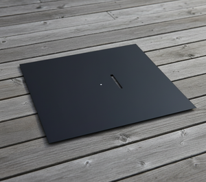 Black rectangular object on a wooden surface
