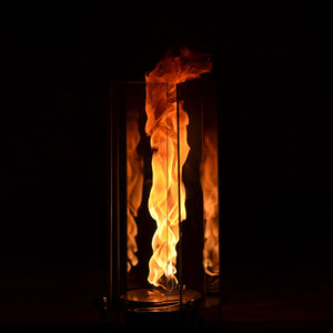 Flame in a glass container against a black background