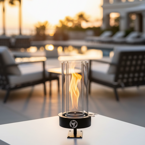 Outdoor setting with a table lamp emitting flames, blurred background of chairs and tables.