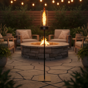 Outdoor patio with fire pit, chairs, and string lights