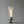 Modern table with a cylindrical fire pit on a gray background