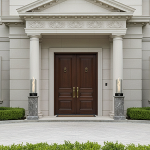 Front entrance of a large house with a brown door and decorative columns.