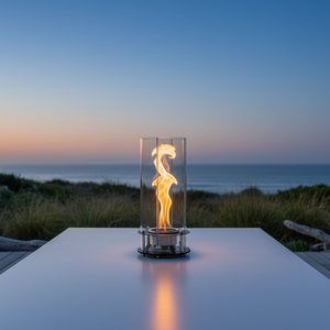 Modern table lamp with glass shade and visible flame on a neutral background