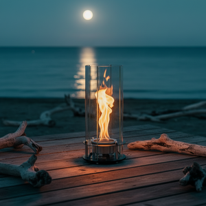 Modern table lamp with glass shade and visible flame on a neutral background