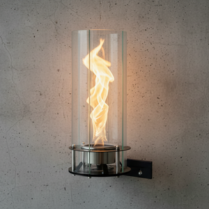 Wall-mounted fire feature with glass enclosure on a concrete wall