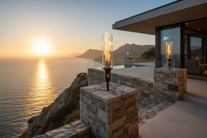 Hollywood Series Vortek post mount fire feature designed for column and post installations, featuring a tall vortex flame and clear glass wind guard for luxury outdoor patios and commercial landscapes