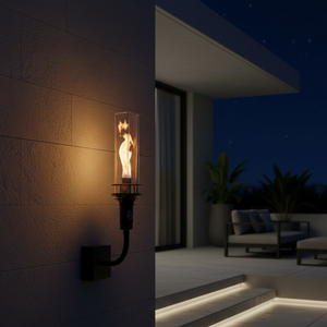 Outdoor wall-mounted gas tiki torch with a tall vertical flame, clear glass wind guard, black metal wall mount arm, and rectangular wall plate, designed for modern patio, garden, and exterior wall lighting using propane or natural gas.