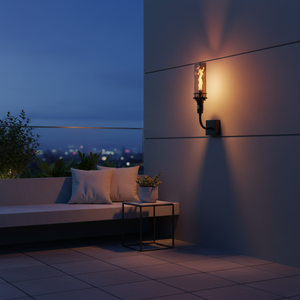 Outdoor wall-mounted gas tiki torch with a tall vertical flame, clear glass wind guard, black metal wall mount arm, and rectangular wall plate, designed for modern patio, garden, and exterior wall lighting using propane or natural gas.