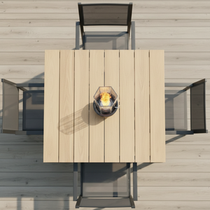 Wooden outdoor table with a fire pit on a wooden deck