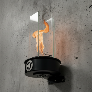 Wall-mounted fire pit with flames against a concrete wall