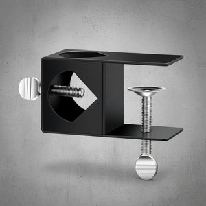 Black metal bracket with screws on a white background