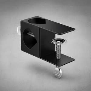 Black metal bracket with screws on a gray background