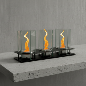 Modern ethanol fireplace with glass panels on a concrete surface