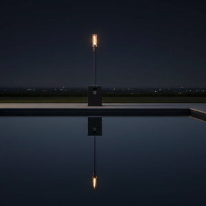 Futuristic torch-like object reflected in a pool at night