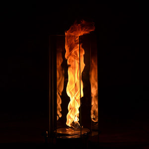 Flame in a glass container against a black background